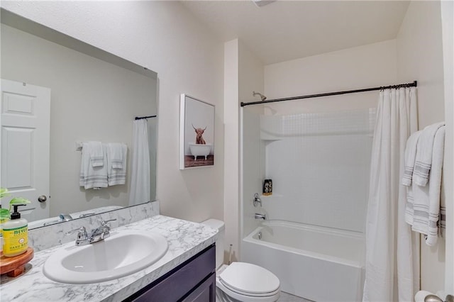 full bathroom featuring shower / bath combo, toilet, and vanity