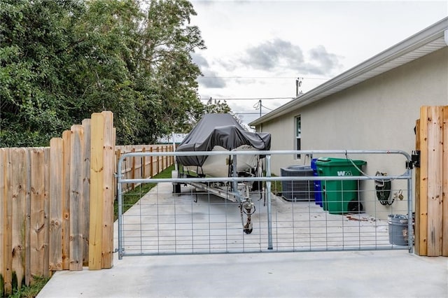 view of gate with central AC unit