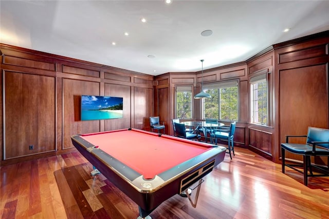 707 Grove Pl, Vero Beach, FL 32963 - game room with a decorative wall, billiards table, recessed lighting, and light wood-style flooring