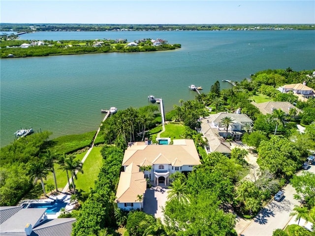 drone / aerial view with a water view