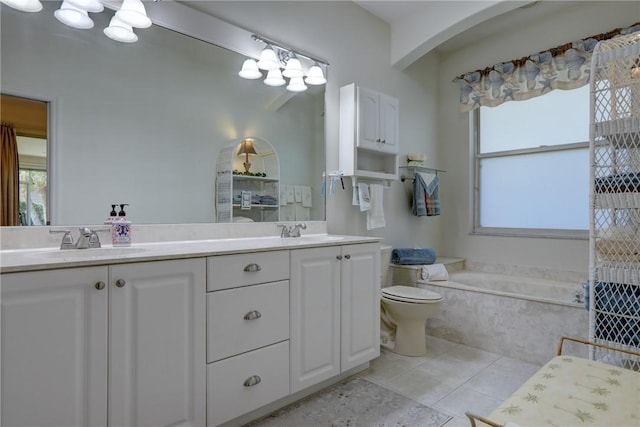 full bath featuring a sink, double vanity, and tile patterned floors