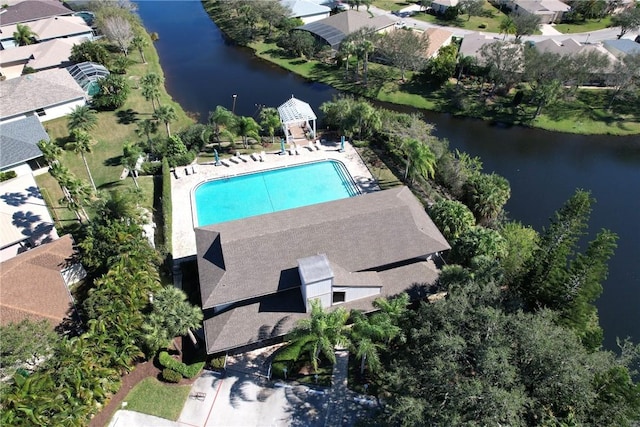 drone / aerial view with a residential view and a water view