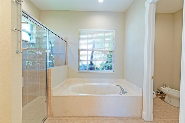 6124 57th Ct, Vero Beach, FL 32967 - full bath featuring plenty of natural light, a shower stall, tile patterned flooring, and a bidet
