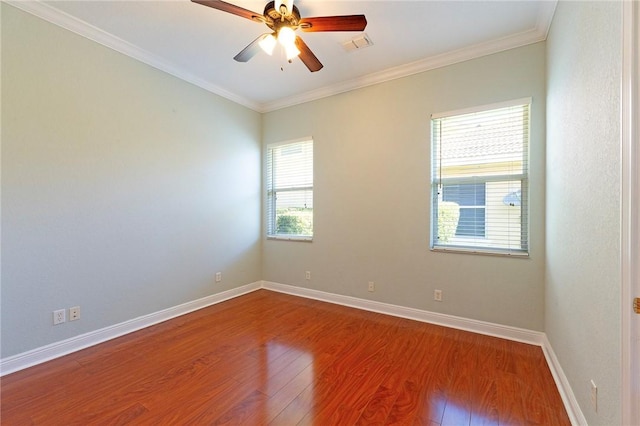 6124 57th Ct, Vero Beach, FL 32967 - unfurnished room with dark wood finished floors, ceiling fan, baseboards, and crown molding