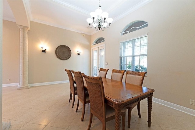 6124 57th Ct, Vero Beach, FL 32967 - dining space with light tile patterned floors, decorative columns, ornamental molding, a chandelier, and baseboards