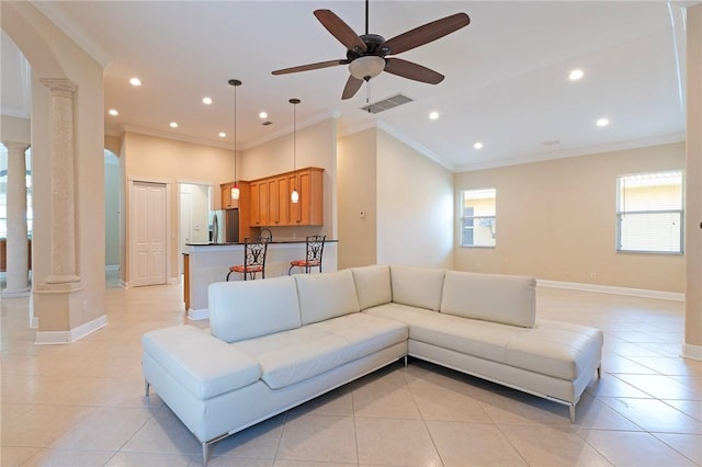 6124 57th Ct, Vero Beach, FL 32967 - living area with ornate columns, light tile patterned floors, recessed lighting, a ceiling fan, and baseboards