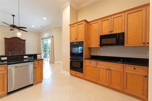 6124 57th Ct, Vero Beach, FL 32967 - kitchen featuring black appliances, crown molding, dark countertops, a ceiling fan, and brown cabinetry