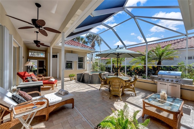 view of patio / terrace with glass enclosure, a grill, ceiling fan, and an in ground hot tub