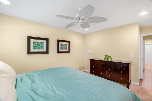 carpeted bedroom featuring ceiling fan