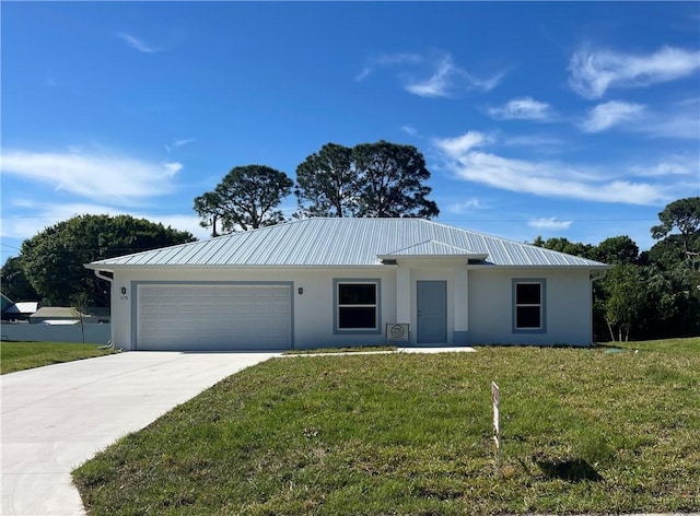 ranch-style home with a garage and a front lawn