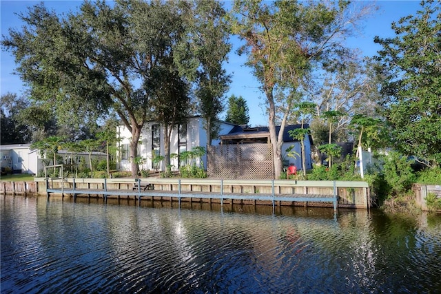 view of dock with a water view