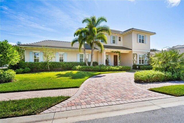 221 Palm Island Ln, Vero Beach, FL 32963 - view of front of property featuring stucco siding