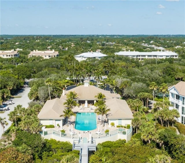 221 Palm Island Ln, Vero Beach, FL 32963 - bird's eye view of a pool and a tree filled landscape
