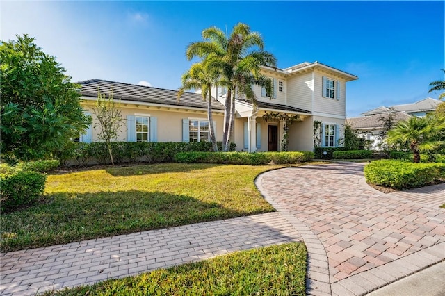 view of front of home with a front yard