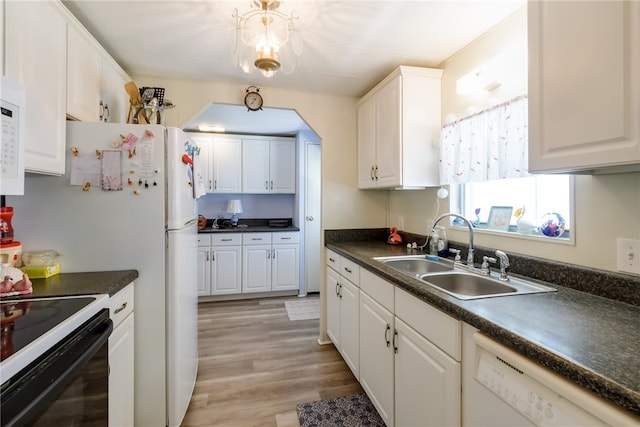 kitchen with sink, electric range oven, dishwasher, light hardwood / wood-style floors, and white cabinets