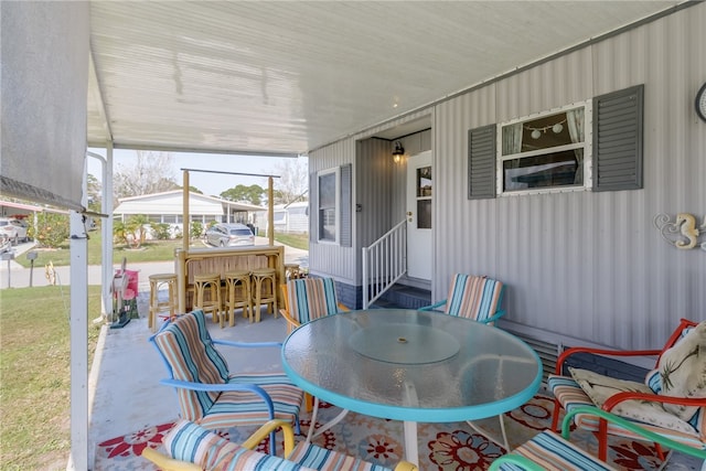 view of patio featuring a bar