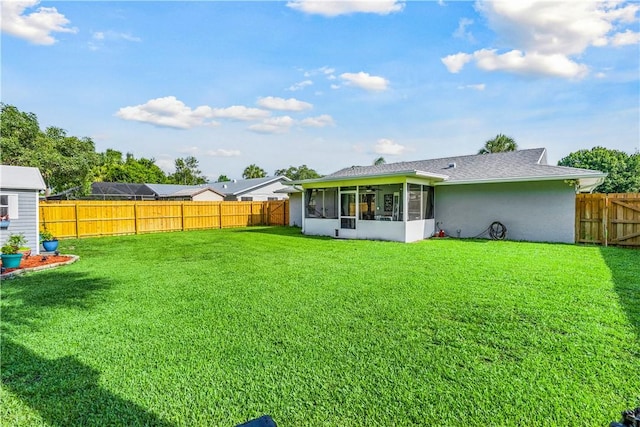 5845 23rd St, Vero Beach, FL 32966 - rear view of property featuring a sunroom and stucco siding