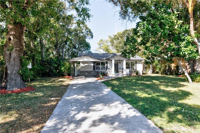 view of front facade featuring covered porch and a front yard