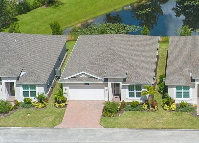 drone / aerial view featuring a water view