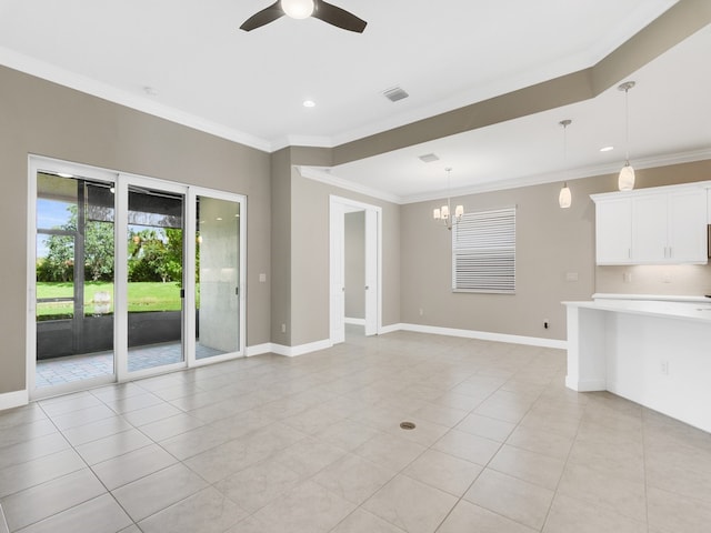 unfurnished living room with ceiling fan with notable chandelier, light tile patterned floors, and crown molding