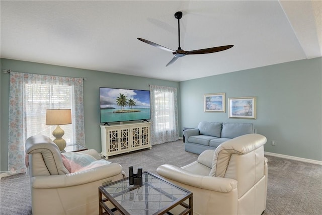 carpeted office space with ceiling fan and a textured ceiling