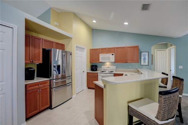 bedroom with ceiling fan, carpet floors, connected bathroom, and a textured ceiling