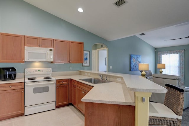 bathroom with tile patterned flooring and vanity