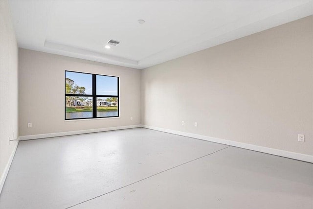 spare room featuring concrete floors