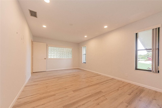 empty room featuring light hardwood / wood-style floors