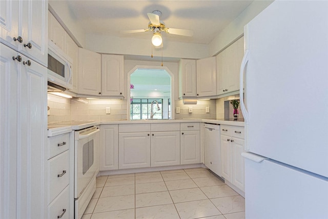 kitchen with white cabinetry, ceiling fan, white appliances, and backsplash