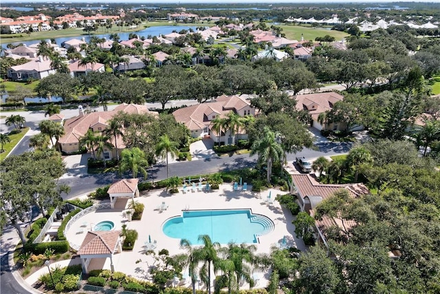 aerial view with a residential view and a water view