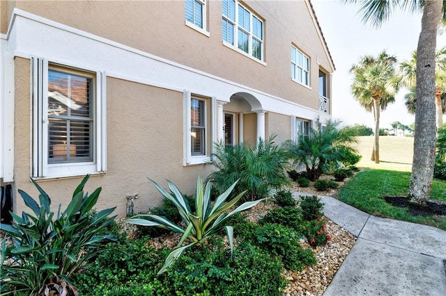 4853 N Newport Island Dr Unit 12B, Vero Beach, FL 32967 - view of property exterior featuring stucco siding