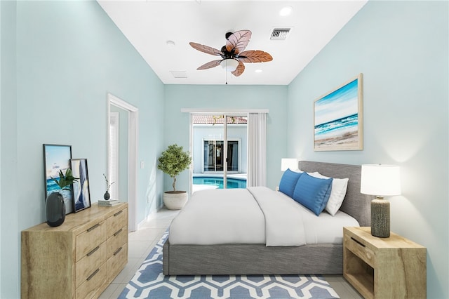 bedroom featuring light tile patterned floors, ceiling fan, and access to outside