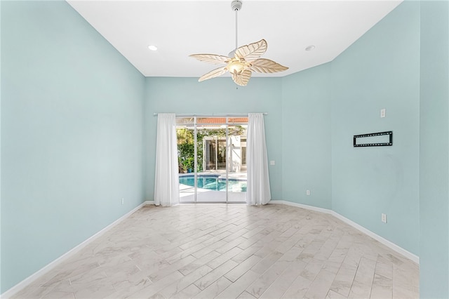 unfurnished room with ceiling fan