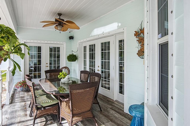 sunroom / solarium featuring ceiling fan, wood ceiling, and french doors