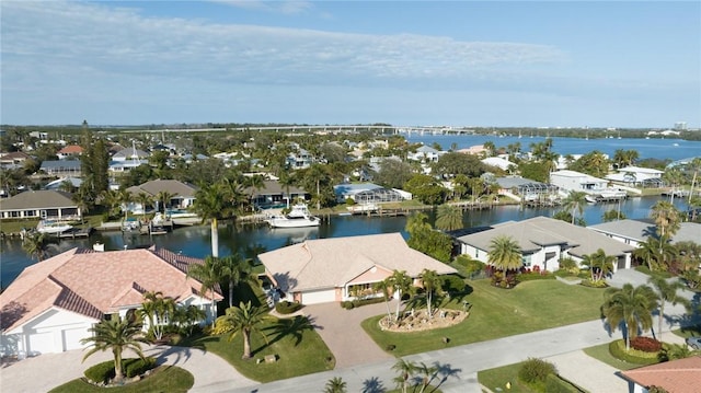 bird's eye view with a water view