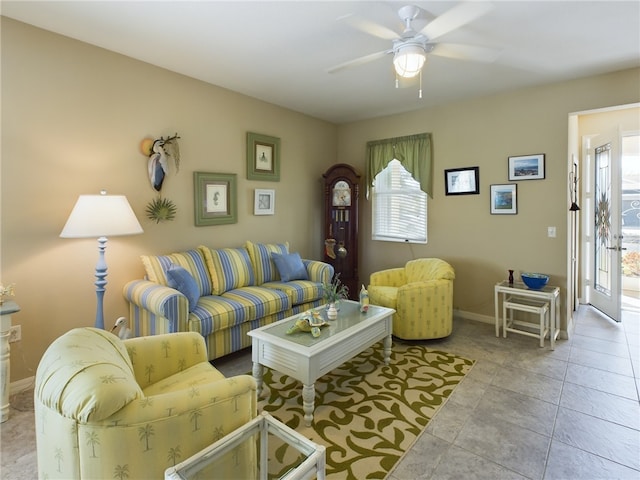 tiled living room featuring ceiling fan