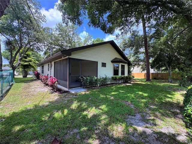 2440 88th Ave, Vero Beach, FL 32966 - back of property with a sunroom