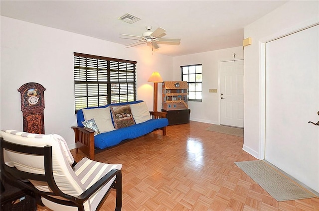 2440 88th Ave, Vero Beach, FL 32966 - sitting room featuring a ceiling fan and baseboards