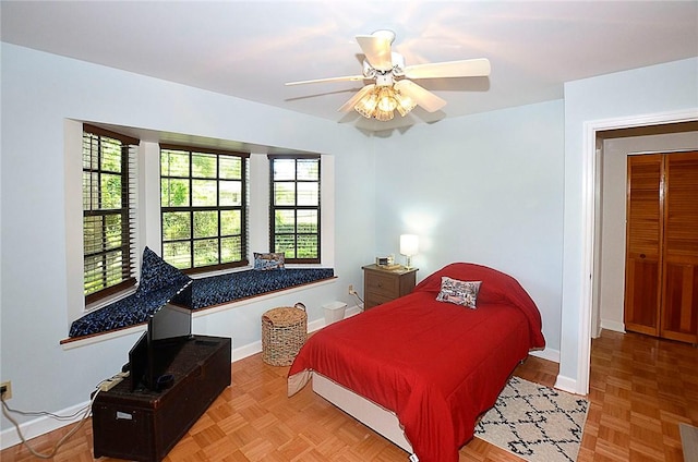 2440 88th Ave, Vero Beach, FL 32966 - bedroom featuring baseboards and ceiling fan