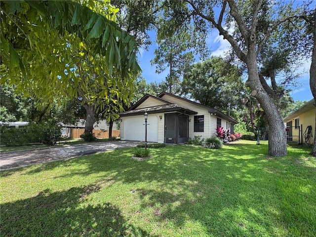 2440 88th Ave, Vero Beach, FL 32966 - view of front of property featuring driveway and an attached garage