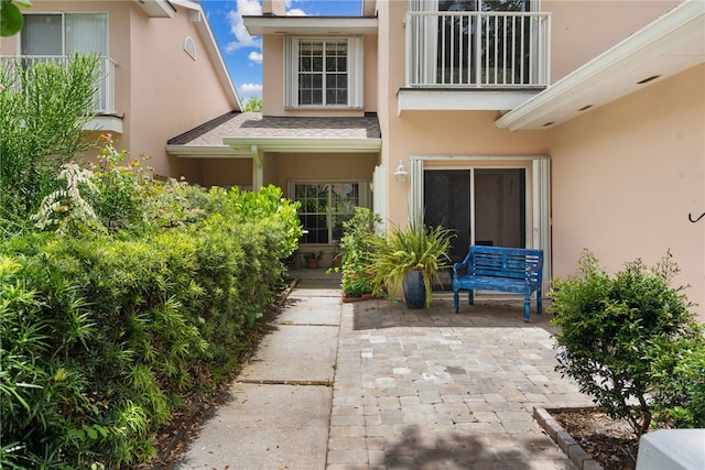 property entrance with a patio area