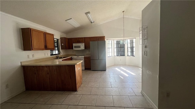 kitchen with sink, kitchen peninsula, vaulted ceiling, white appliances, and light tile patterned flooring