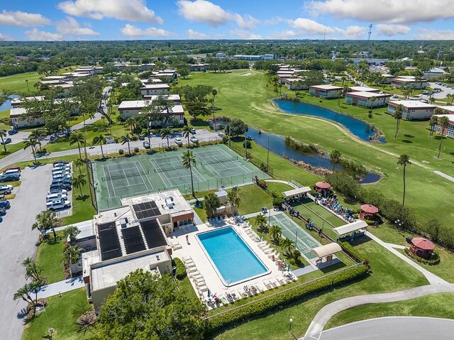 41 Woodland Dr Unit 102, Vero Beach, FL 32962 - aerial view of a nearby body of water, a local golf course, and a pool area