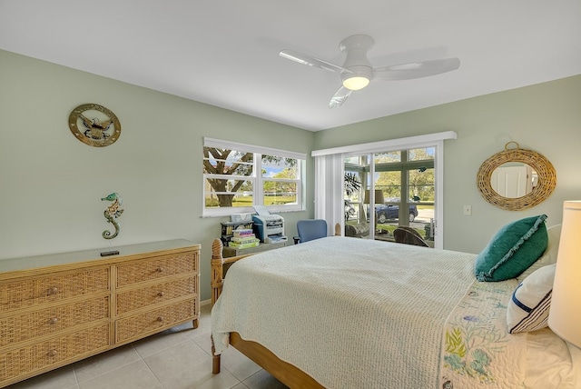 41 Woodland Dr Unit 102, Vero Beach, FL 32962 - bedroom featuring a ceiling fan and light tile patterned floors