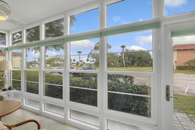 41 Woodland Dr Unit 102, Vero Beach, FL 32962 - sunroom / solarium featuring tile patterned floors