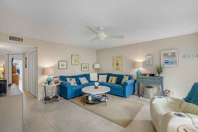 41 Woodland Dr Unit 102, Vero Beach, FL 32962 - living room featuring a ceiling fan and light tile patterned flooring