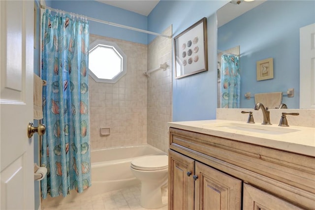 full bathroom with tile patterned flooring, shower / tub combo with curtain, vanity, and toilet