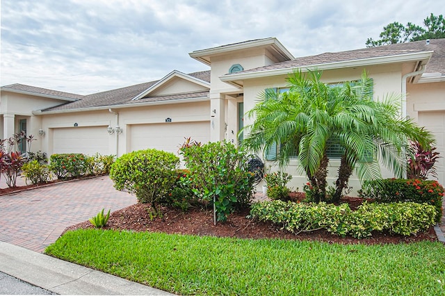 view of front of property with a garage