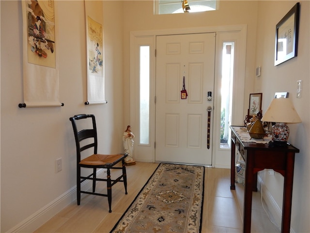 entrance foyer with light wood-type flooring